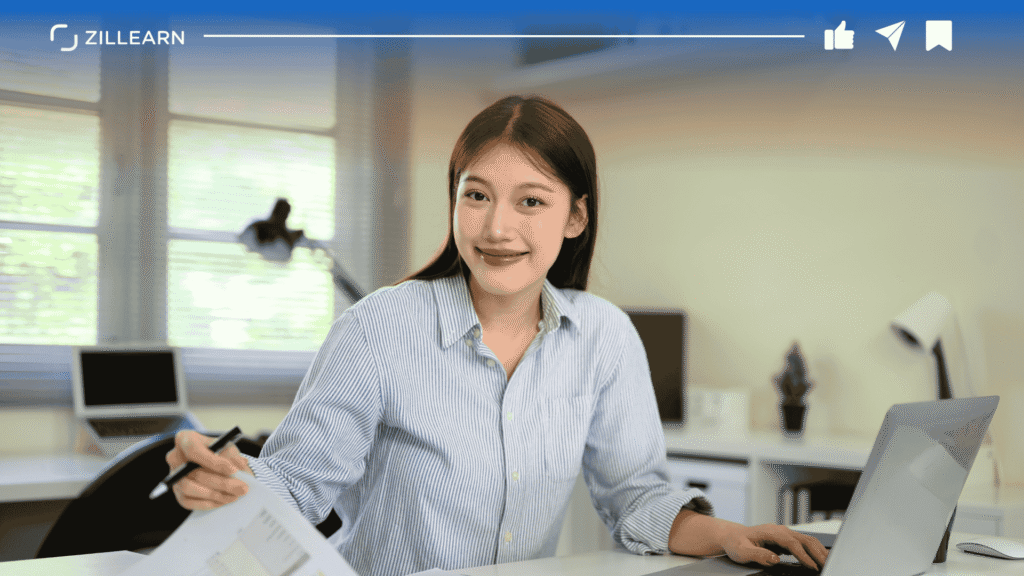 A diverse Southeast Asian enterprise team collaborating around digital tools in a modern workplace
